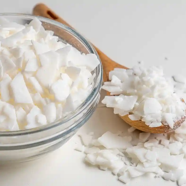 Soy wax pieces in glass bowl